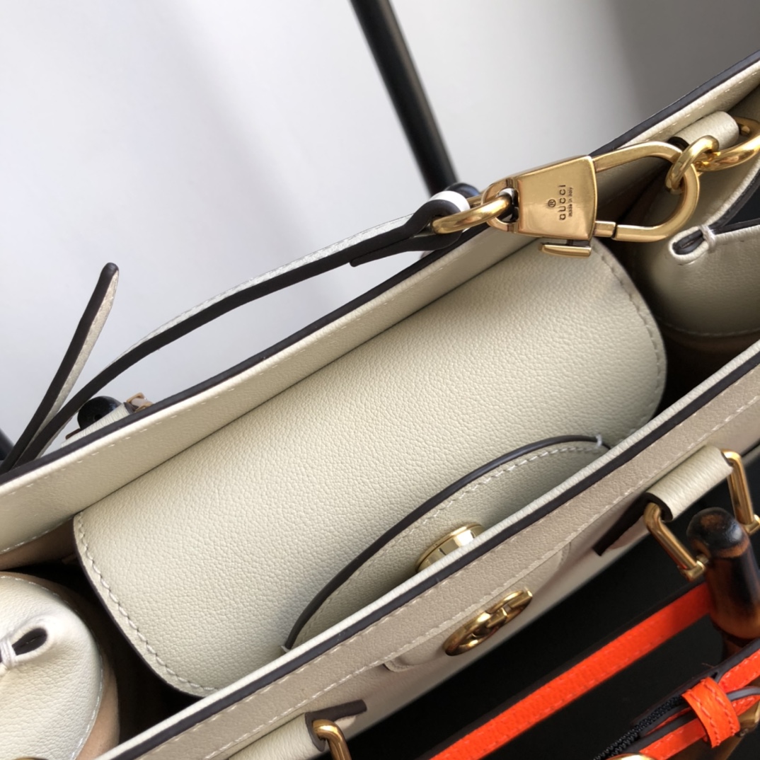 G*u*i diana top handbags