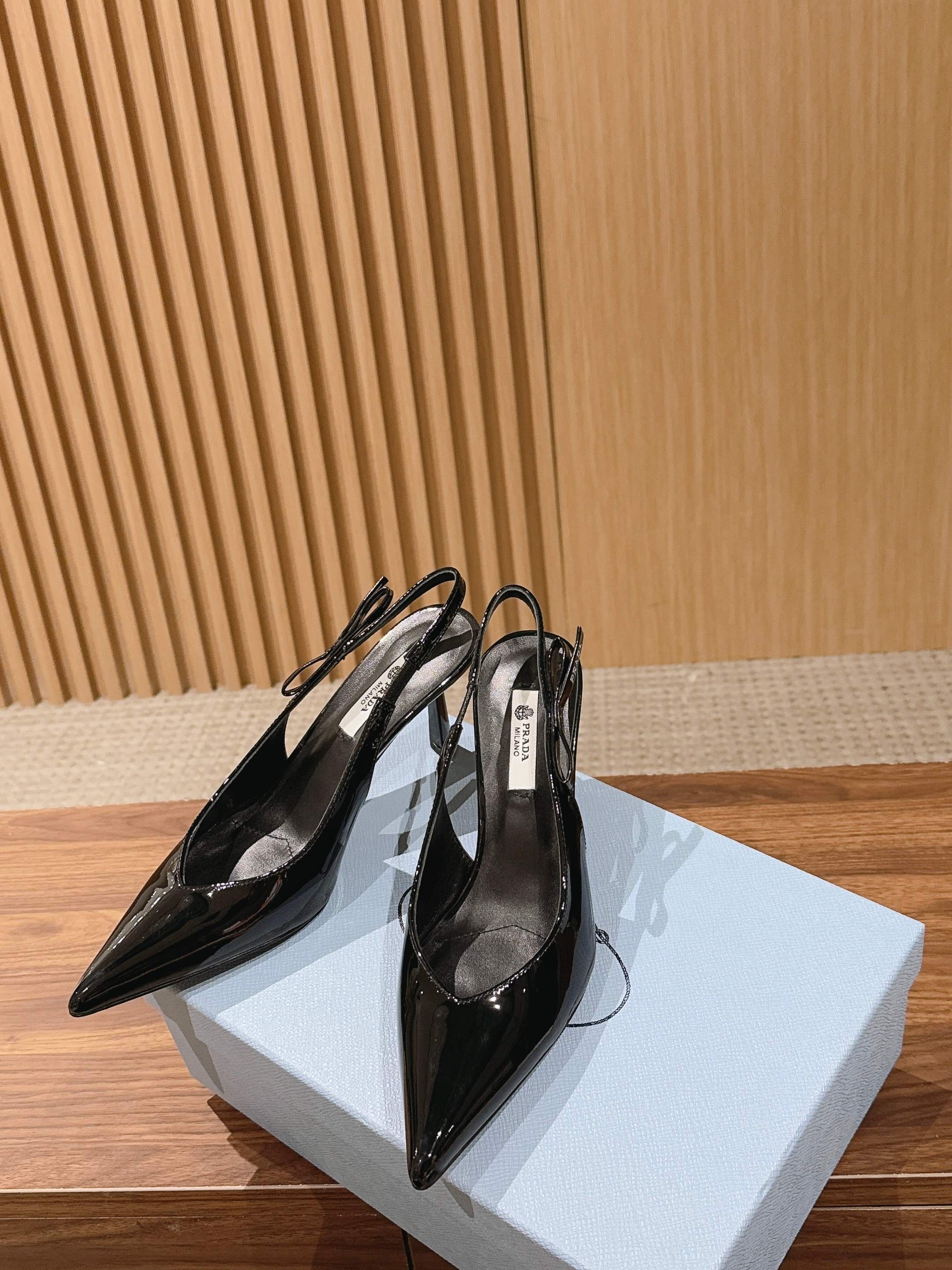 Pra*a Black Patent Leather Slingback Pumps